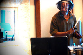 Basiri Johnson recording percussion for Prema